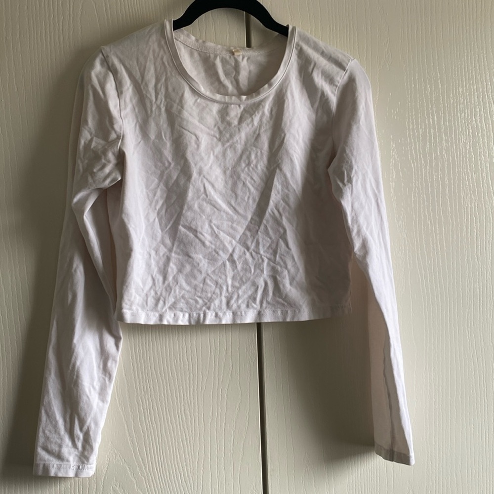 White Medium long sleeve crop top. Never worn
